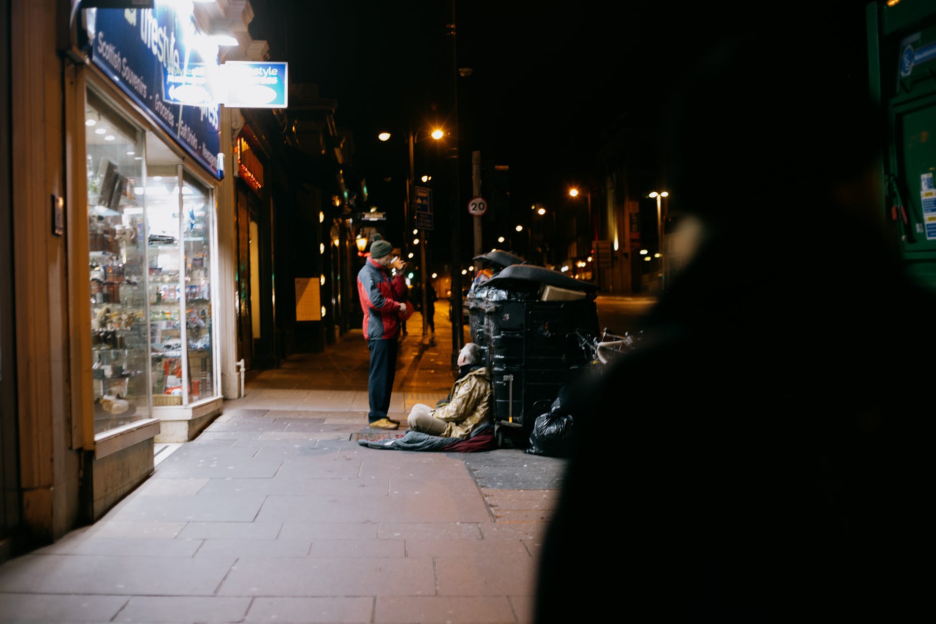 One Beggar Helping Another Beggar Find Food…